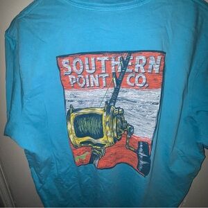 Southern Point Co. men’s large turquoise blue short sleeve T fishing reel